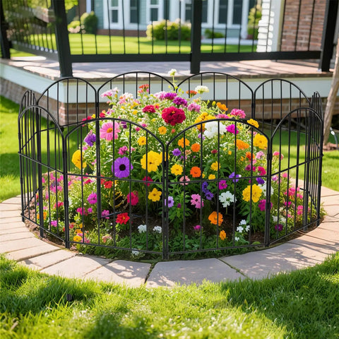 Decorative Garden Fence For Yard And Patio, Rustproof Black Metal Barrier Panels, 10-Panel Set around colorful flower bed outdoors.