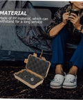 Tough Mud Color Outdoor Storage Box near camper, open lid showing interior padding, weatherproof build for adventures.