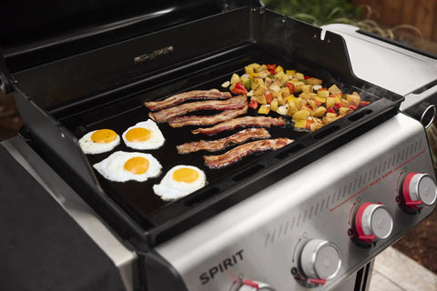 Rust Resistant Outdoor Griddle Insert Full Size Pre Seasoned Carbon Steel Griddle For Searwood And Large Spirit Series Gas Grills Transform Your Grill Into A Flat Top Ready Surface With Even Heat Distribution And Durable Rust Resistant Construction with breakfast cooking on it.