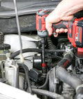 Using Long Reach Three Eighths Inch Drive Socket Extension Set on car engine for tight spaces with 12-inch extension.
