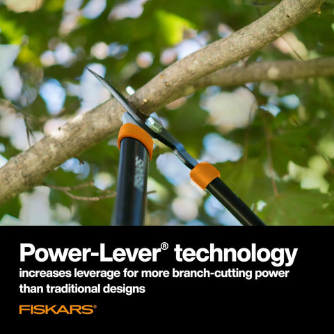 Go-To 28-Inch Power-Lever Bypass Lopper trimming tree branch, highlighting Power-Lever technology for enhanced cutting strength.