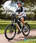 Person riding OUREA 26 Electric Bike For Adults, 750W Peak Motor All Terrain Ebike on a sunny park path
