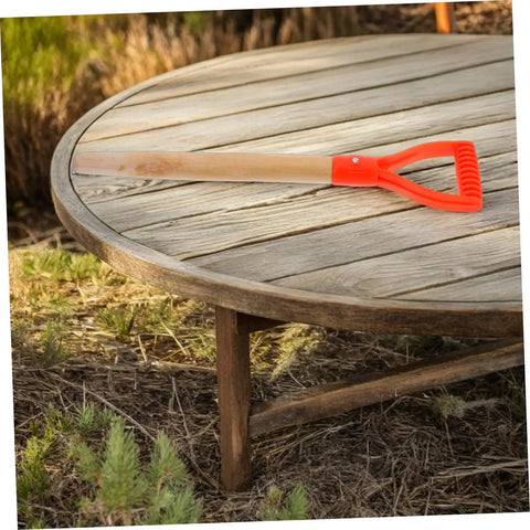 Garden Fork Replacement Handle D Shape Wooden Shovel Grip With Nonslip Surface resting on a wooden outdoor table