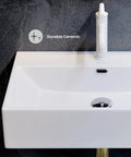 Close-up of 24 Inch Rectangle Wall Mount Bathroom Sink Sleek Space Saving Ceramic Vanity Basin With Durable Non Porous Scratch Resistant Finish