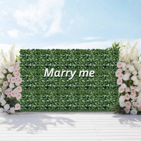 Realistic Fake Ivy Privacy Fence Screen 40x120 Inches For Indoor Outdoor Use No Fuss Easy Install 12 Link Panel with 'Marry Me' text.
