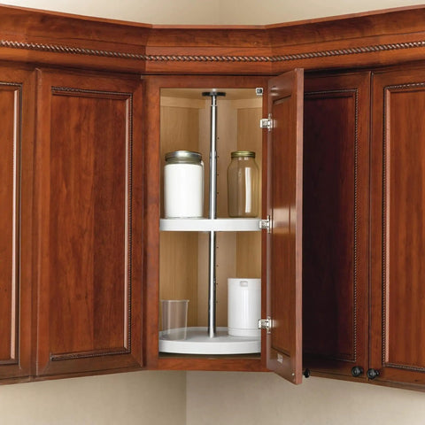 Top Shelf 20 Inch Double Lazy Susan For Upper Corner Kitchen Cabinets, White Plastic Two Tier Turntable Shelf spinning in a cabinet, storing jars and containers.