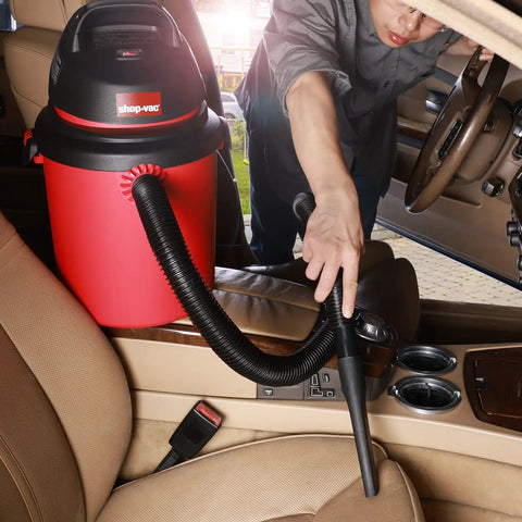 4 Gallon 4.0 Peak HP Wet Dry Shop Vacuum Grab-and-Go Portable used in car interior for seat cleaning