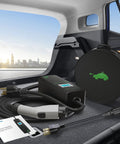 Portable Level 1 And 2 Ev Charger Cord 3.84Kw Fast Charge with 23ft heavy duty cable in car trunk with city view.
