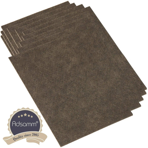 Pack Of Ten Brown Self Adhesive Felt Sheets For Furniture And Chairs, high-density pads stacked for floor protection.