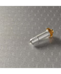 Cricut Engraving Tip with QuickSwap Housing; silver carbide steel tip with gold gear, side view.
