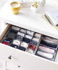 Organize Your Dresser Like A Boss With Heavy Duty Deep Drawer Organizers Collapsible Breathable Canvas Storage Bins Gray Fold Away Closet Shelf filled with rolled clothing.