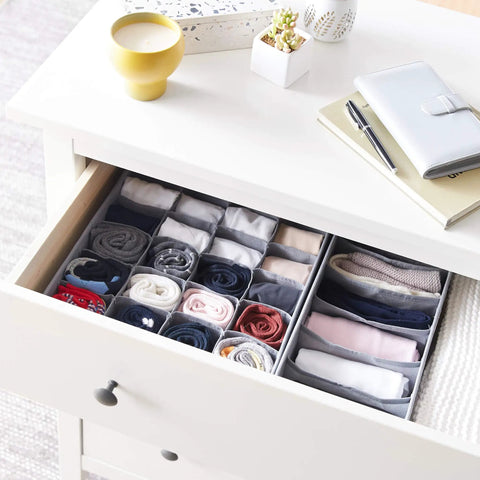 Organize Your Dresser Like A Boss With Heavy Duty Deep Drawer Organizers Collapsible Breathable Canvas Storage Bins Gray Fold Away Closet Shelf filled with rolled clothing.
