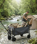 Collapsible Utility Wagon 102L Storage, Heavy Duty Folding Cart With Lockable Brakes, 330 lbs Capacity in a camping setting