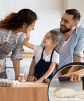 Family baking with a stainless steel bench scraper featuring 1 to 6 inch measurement marks for even dough portions and pizza cutting.