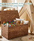 Large Water Hyacinth Wicker Storage Chest With Metal Frame, Beefy Heavy-Duty Trunk With Lid, filled with toys and pillows