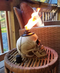 Two Pack Skull Tiki Torch Outdoor Patio Decor For Halloween And Gothic Vibes, Epic Fire Display Skull Table Torches on patio table