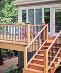 Black 3.5 By 3.5 Inch Post Caps For Wood Fence And Deck Posts 12 Pack With 24 Screws installed on wooden deck railing