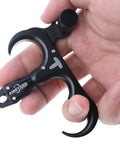 Close-up of hand holding Ultimate Game Changing Archery Bow Release For Compound Bows, Durable Aluminum Caliper Thumb Release, Black