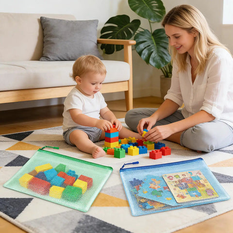 Child playing with blocks on a rug with two 24 Pack Mesh Zipper Pouches For Organization A4 Size Document Bags nearby.