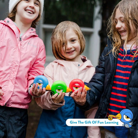 Children holding Kid Friendly 8 Foot Tape Measure With Blue Bird Design STEM Educational Tool featuring level and protractor.