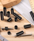 Outlet Spacer Kit With 120 Non-Threaded 6mm Rubber Spacers, assorted sizes on a table with screws and ruler, black