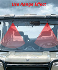Badass 165 Degree UTV Windshield Wiper Kit With Reinforced Metal Arm And Tough Rubber Blade visible on windshield during rain.