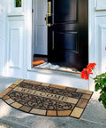 Heavy Duty Entrance Door Mat 24 By 36 Inch Large Entryway Doormat Non Slip Rubber Back Low Profile For Front Porch Garage Patio High Traffic Outdoors Welcome Mat on stone steps in front of open door with flowers nearby.