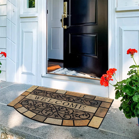 Heavy Duty Entrance Door Mat 24 By 36 Inch Large Entryway Doormat Non Slip Rubber Back Low Profile For Front Porch Garage Patio High Traffic Outdoors Welcome Mat on stone steps in front of open door with flowers nearby.