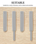 Hidden Push Latch Kit Four Piece for Closet Doors and Cabinets on wood surface, suitable for wardrobes and cupboards.