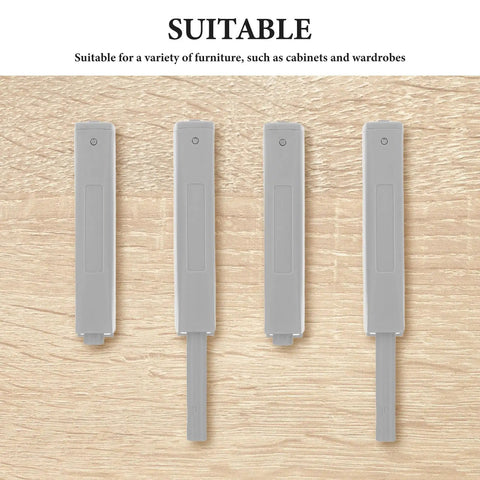 Push To Open Cabinet Latch Set 4 Pack gray plastic latches on wood surface, ideal for handleless kitchen cabinets and wardrobes.
