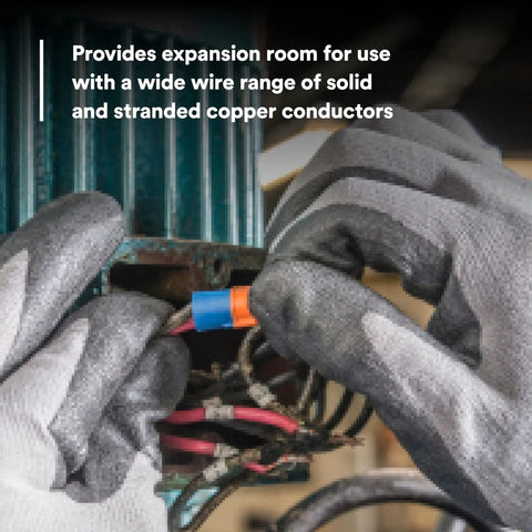 Gloved hands using Two In One Twist On Wire Connector Set 22-12 AWG Orange Blue for secure pigtail connections.