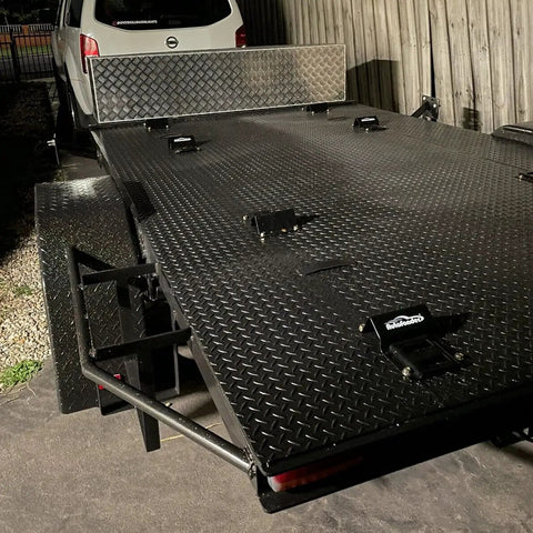 Beefed Up Heavy Duty Wheel Chock Tie Down Kit With 4500 Lb Break Strength shown installed on trailer surface