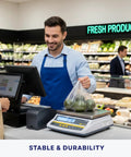 Man using Digital Food Scale For Commercial Kitchens With Pro Grade Rechargeable Battery, NTEP Class III Legal For Trade, Large Stainless Steel Platform in store