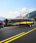 Heavy-duty ski & wakeboard tower boat cover on trailer, fits boats 20'-22', highways travel, weather-resistant protection.