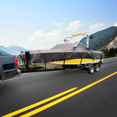 Heavy-duty ski & wakeboard tower boat cover on trailer, fits boats 20'-22', highways travel, weather-resistant protection.