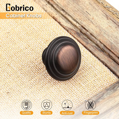 Oil Rubbed Bronze Cabinet Knob Set 5 Pack 1-3/8 Inch Round Knobs With 1 Inch Screws For Kitchen Cabinets on burlap surface