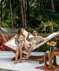 Two Person Double Quilted Fabric Hammock With Spreader Bar And Detachable Pillow For Outdoor Patio Backyard Poolside 450 Lb Weight Capacity 78 By 55 Inch Bed Ultra Comfy Natural featured outdoors with couple relaxing