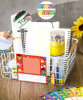 36 Piece Kids Photo Nameplates For Desks With Photo Space Up To 2.4 By 2.75 Inches Self Adhesive Labels in a wire basket
