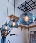 Pendant lights in a kitchen, focus on hand blown marble blue glass pendant light for kitchen island over dining table dope modern farmhouse globe eight point seven inch ceiling fixture in brushed nickel finish with easy install and balanced hanging.