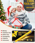Couple holding gift box beside Christmas tree with Six In One Multitool Pen Gift For Him Stocking Stuffers For Men in foreground.