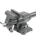 Multi-Purpose Bench Vise With 6-1/2 Inch Jaw Width And 6-1/4 Inch Opening, 3-1/4 Inch Throat, 360 Degree Rotating Head, Indexed At 30 Degree Increments, Replaceable Hardened Steel Jaws, Built-In Anvil, Serrated Jaws For Secure Grip. gray metal bench vise with rotating base and serrated jaws