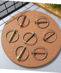 Secure Locking Pin Kit For Trucks Farm Tractors And Trailers 10 Pcs Lynch Pin Assortment With Easy Install Clips Durable Fasteners For Safe Tight Hitch Latches And Equipment Now, 10 metal pins on cork board