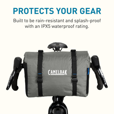 MULE 12 Bikepacking Handlebar Bag IPX5 Waterproof Roll-Top With Aluminum Stabilizer Bar on bike handlebars