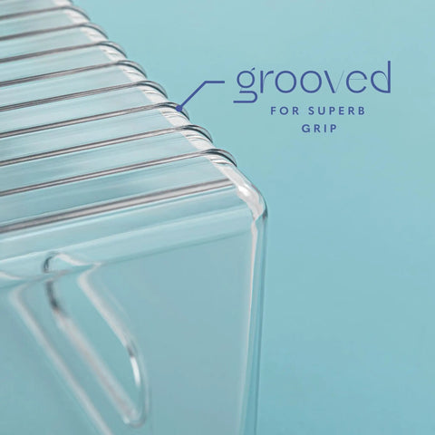 Close-up of grooved handle on Six Pack Clear Plastic Organizer Bins With Handles For Home Organization Kitchen Pantry Fridge Freezer Cabinets.