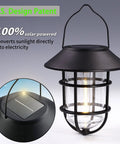 Outdoor Solar Lanterns With Hooks, black rust-resistant aluminum, clear glass, waterproof metal wall lantern with solar panel close-up