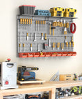 Metal Pegboard Organizer With Hooks Wall Mounted Tool Storage System With Shelves And Bins in a workshop setting