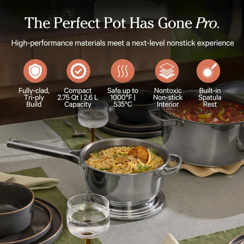 Mini Titanium Perfect Pot Pro 2.75 Qt Cooking Pot With Lid And Silicone Spoon, PFAS-Free, filled with rice on a dining table.