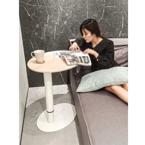 Adjustable Height Rolling Laptop Stand With Spacious Work Surface Smooth Caster Wheels Portable Computer Desk For Bedroom Living Room And Home Office Kick Back Ready Workstation by the couch with a magazine and coffee.