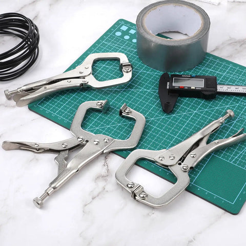 Heavy Duty Locking C Clamp Set Ten Pieces Six Inch Vise Grip Welding Clamps on cutting mat with tools
