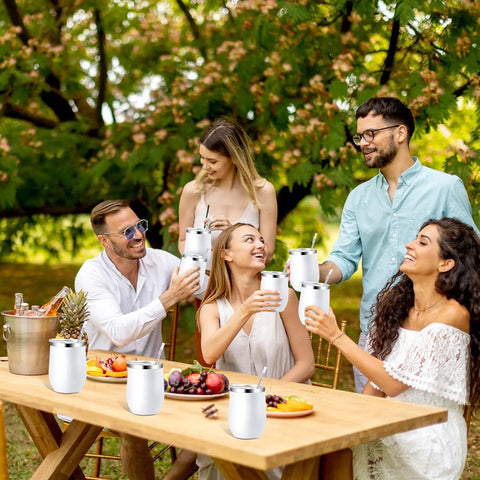Snag This Solid Bulk Set Of Thirty 12 Ounce Double Wall Insulated Stainless Steel Tumblers With Lids And Straws Plus Cleaning Brushes For Weddings Parties And Favors, group enjoying drinks outdoors.